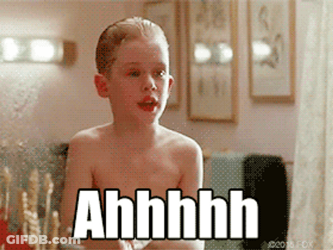 Little Boy Shocked Meme Tapping Face GIF