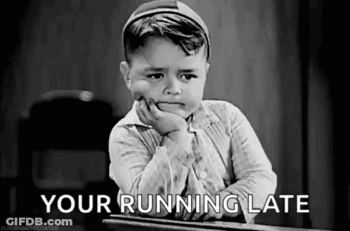 Little Boy Sitting At Desk Hand On Chin Your Running Late GIF
