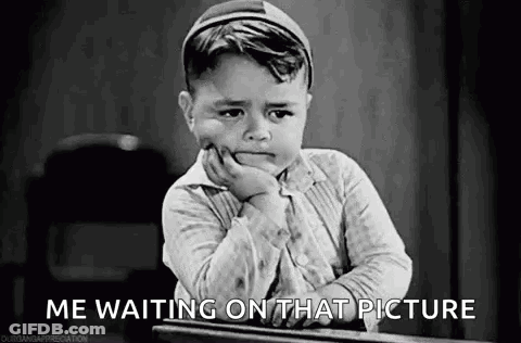 Little Boy Sitting At Desk Waiting GIF