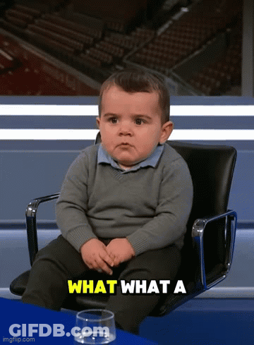 Little Boy Sitting In Chair Saying What What A GIF