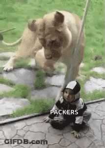Little Boy Sitting Next To Lion GIF
