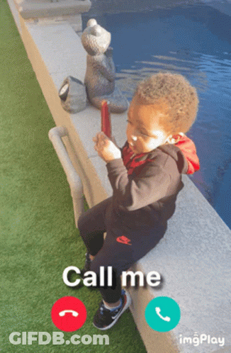 Little Boy Sitting On Wall Saying Call Me GIF