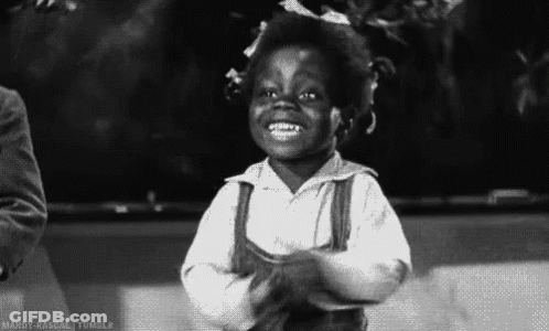 Little Boy Smiling With Hands In Air GIF