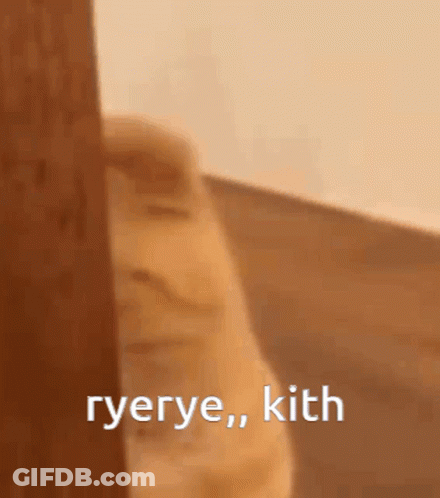 Little Boy Standing Next To Yellow Bag With Chinese Symbol GIF