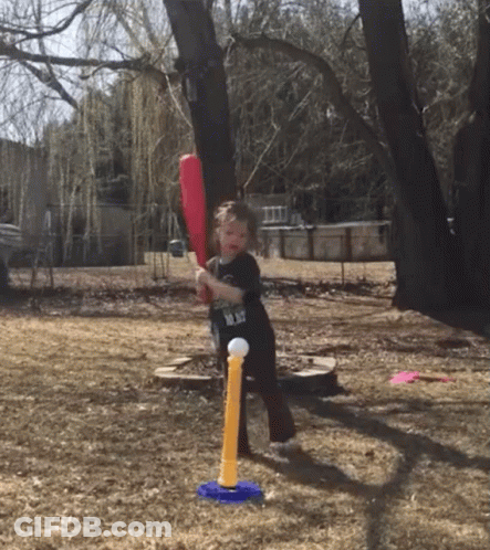 Little Boy Swinging Bat At Toy Ball GIF