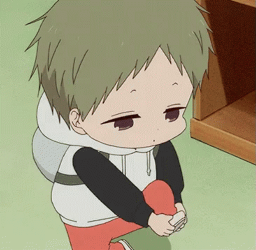 Little Boy Takes Off Cartoon Shoes GIF