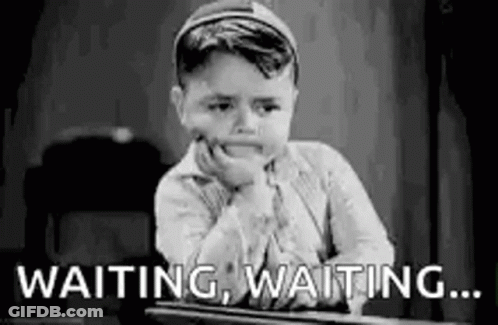 Little Boy Waiting With Hand On Chin GIF