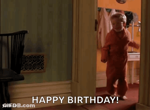 Little Boy Walking Through Doorway Saying Happy Birthday GIF