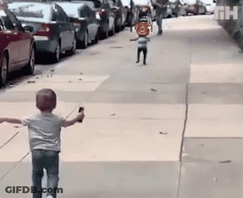 Little Boy Walking With Donald Trump Balloon GIF