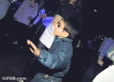Little Boy Wearing Sunglasses Dancing In Dark Room GIF