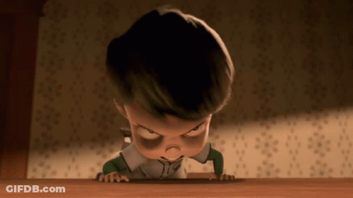 Little Boy With Black Eye Crawling On Wooden Floor GIF