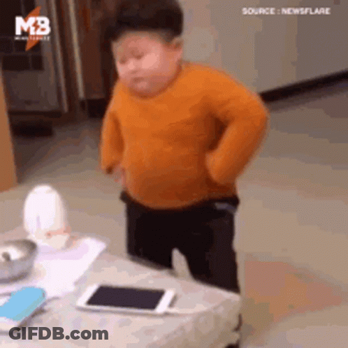 Little Boy With Cell Phone GIF