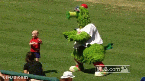 Little Girl And Phillies Mascot On Baseball Field GIF