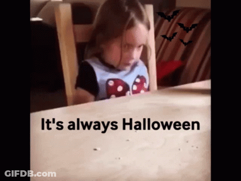 Little Girl At Table Says It's Always Halloween GIF