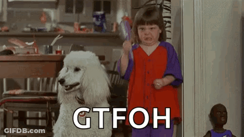 Little Girl Brushing Teeth Next To Poodle GIF