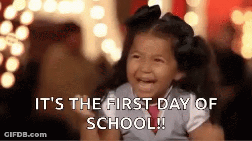Little Girl Crying In Front Of First Day Of School Sign GIF