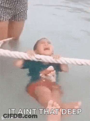 Little Girl Crying In Swimming Pool Held By Rope GIF