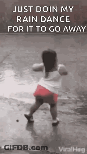 Little Girl Dancing In Rain GIF