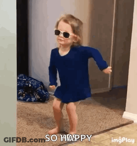 Little Girl Dancing In Sunglasses And Blue Dress GIF