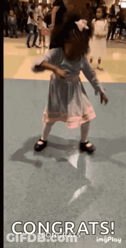 Little Girl Dancing With Congrats GIF