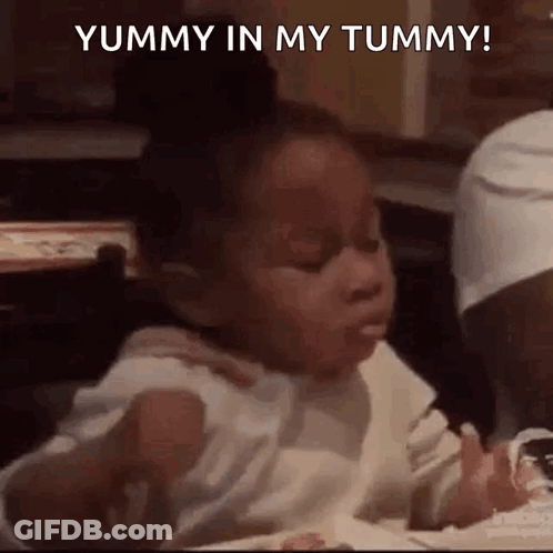 Little Girl Eating Food Making Funny Face GIF