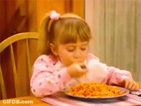 Little Girl Eating Spaghetti With Fork GIF
