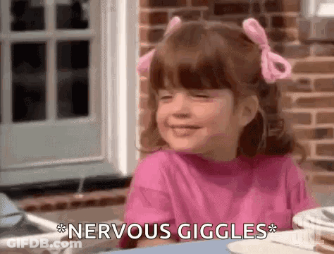 Little Girl Eyes Closed Nervous Giggles GIF