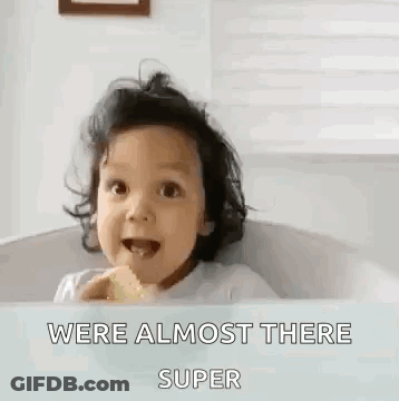 Little Girl Giving Thumbs Up And Smiling GIF