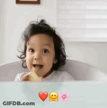 Little Girl Giving Thumbs Up In Bathtub GIF