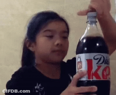 Little Girl Holding Diet Coke GIF