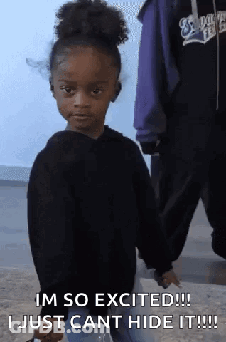 Little Girl Holding Hand Saying I'm So Excited I Just Can't Hide It GIF