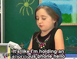 Little Girl Holding Phone Says It's Enormous GIF