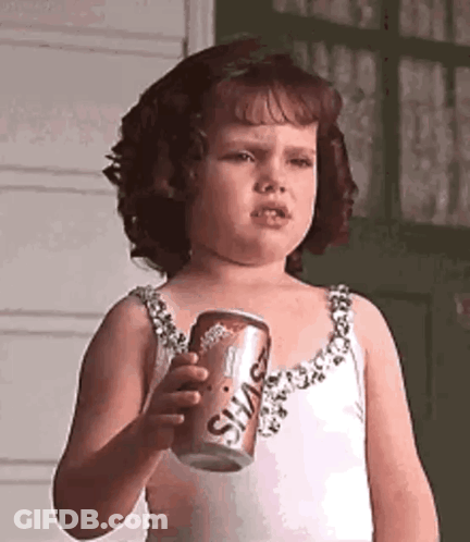 Little Girl Holding Soda Can Making Face GIF