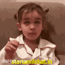Little Girl Holding Something GIF