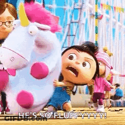 Little Girl Holding Stuffed Unicorn At Carnival GIF