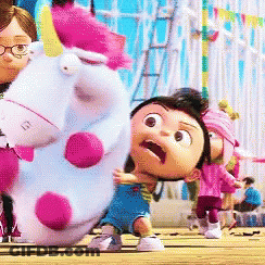Little Girl Holding Unicorn Stuffed Animal GIF