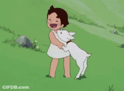 Little Girl Holding White Goat GIF