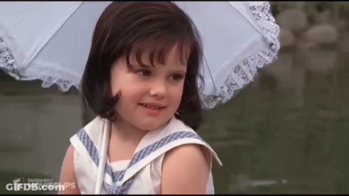 Little Girl Holding White Umbrella Movieclips GIF
