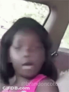 Little Girl In Back Seat Eyes Closed Mouth Open GIF
