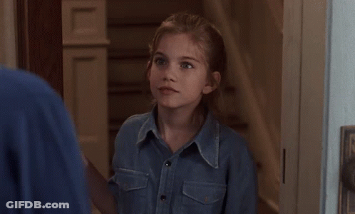 Little Girl In Denim Shirt Saying Sure GIF