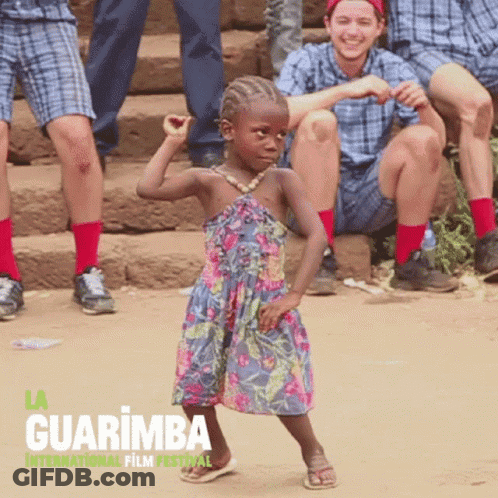 Little Girl In Dress Dancing At Guarimba Film Festival GIF