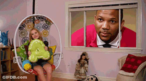 Little Girl In Hanging Chair Holding Letter A GIF