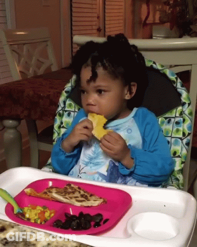 Little Girl In High Chair Eating GIF