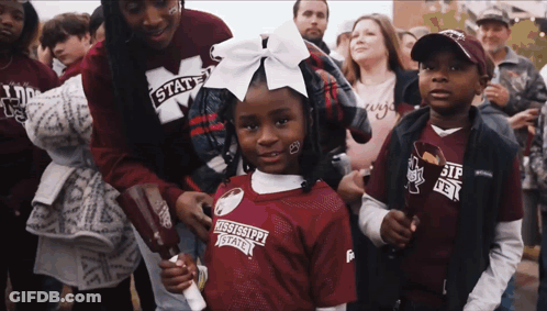 Little Girl In Mississippi State Jersey In Crowd GIF