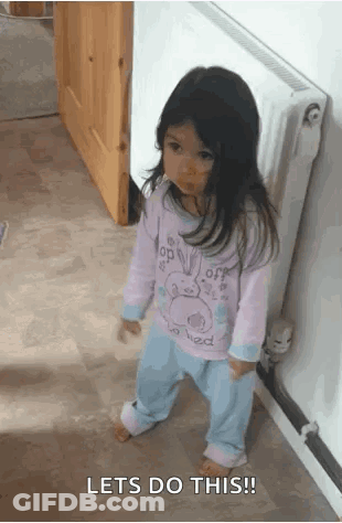 Little Girl In Pajamas Next To Radiator Lets Do This GIF