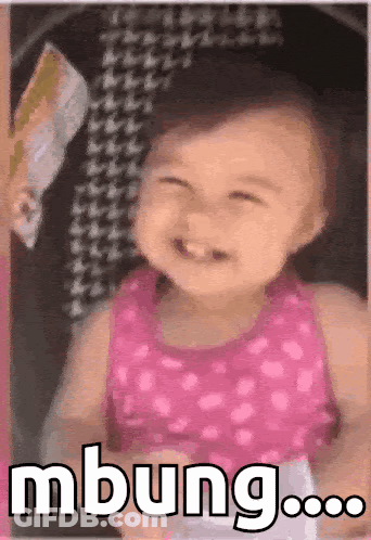Little Girl In Pink Dress Dancing In Front Of TV GIF