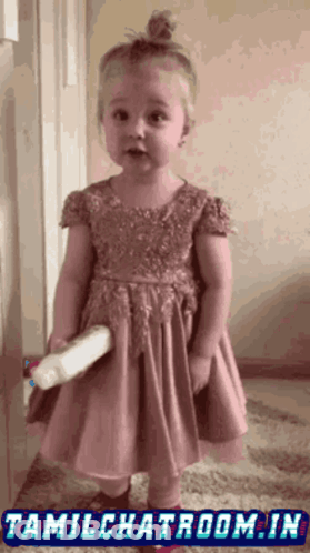 Little Girl In Pink Dress Holding Bottle With Tamilchatroom.in GIF