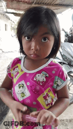 Little Girl In Pink Hello Kitty Shirt GIF