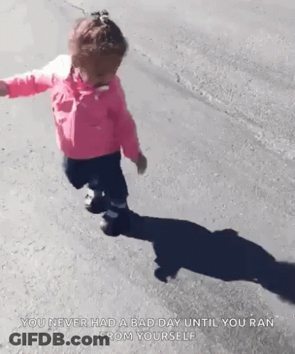 Little Girl In Pink Jacket Walking With Shadow GIF