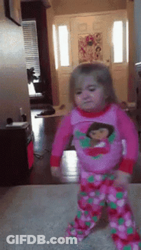 Little Girl In Pink Pajamas Dancing GIF
